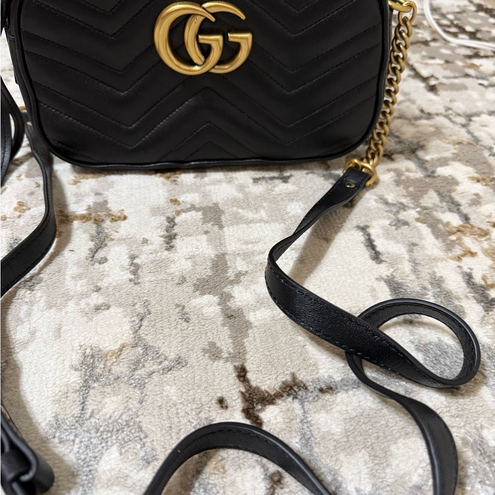 Black Quilted Crossbody Bag with Gold Accents